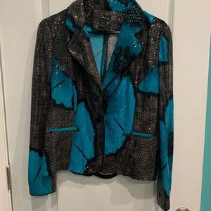 shiny black and turquoise flowered jacket